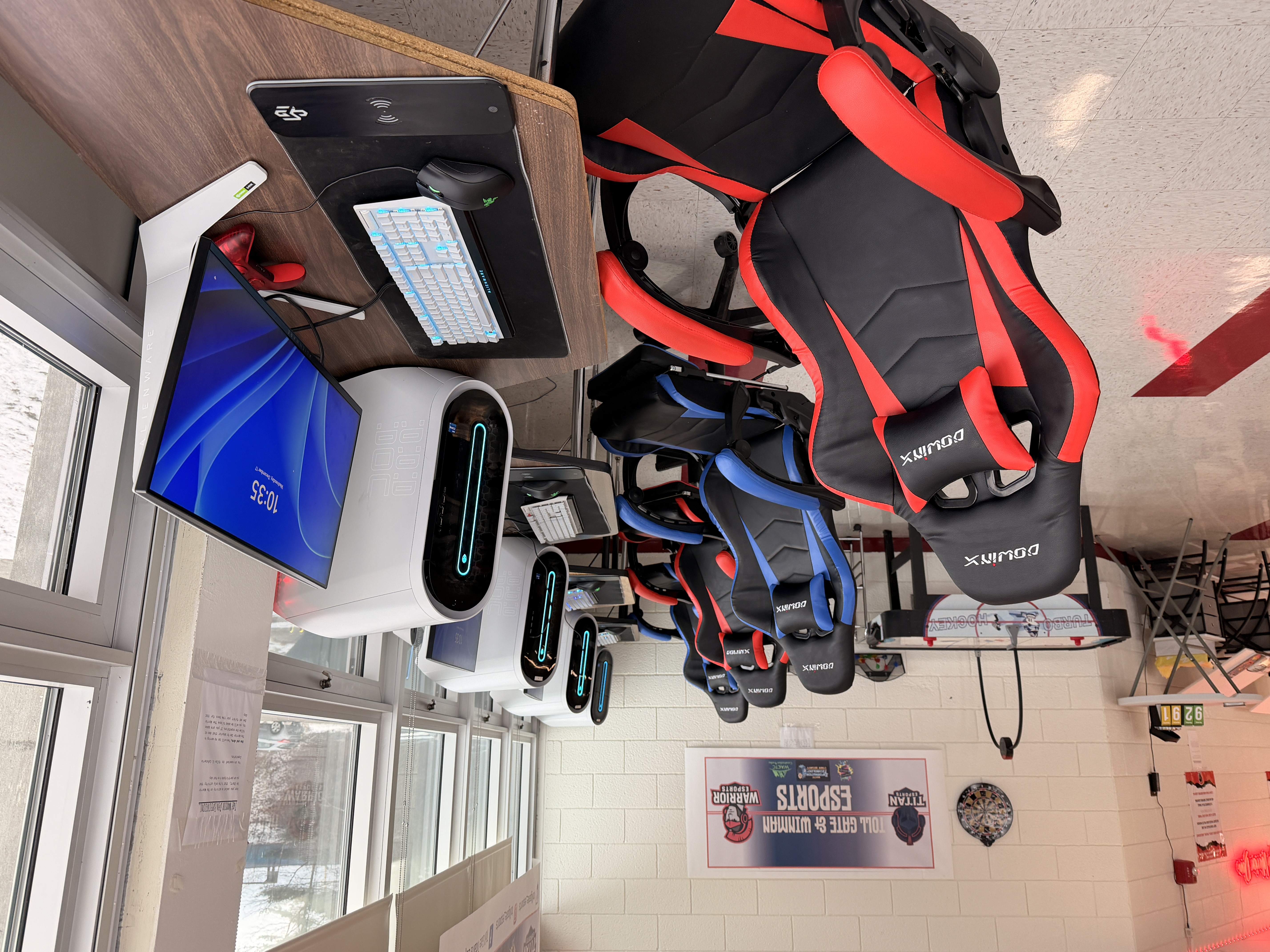 Warwick middle school esports setup with student gaming stations and custom PCs